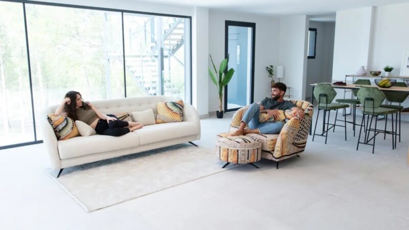 White sofa and upholstered armchair