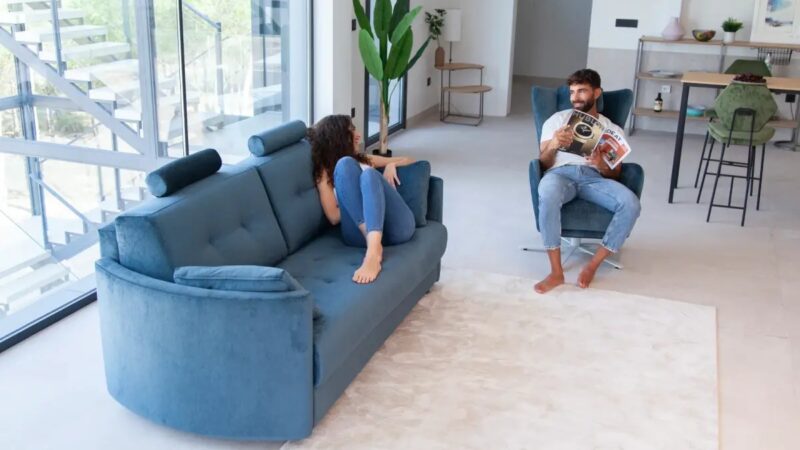 Living room with blue sofa