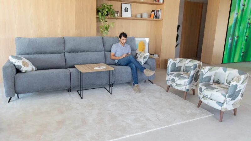 Relax Axel sofa and Peque armchairs by Fama Sofas