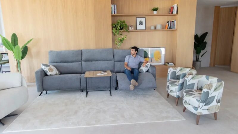 Relax Axel sofa and Peque armchairs by Fama Sofas