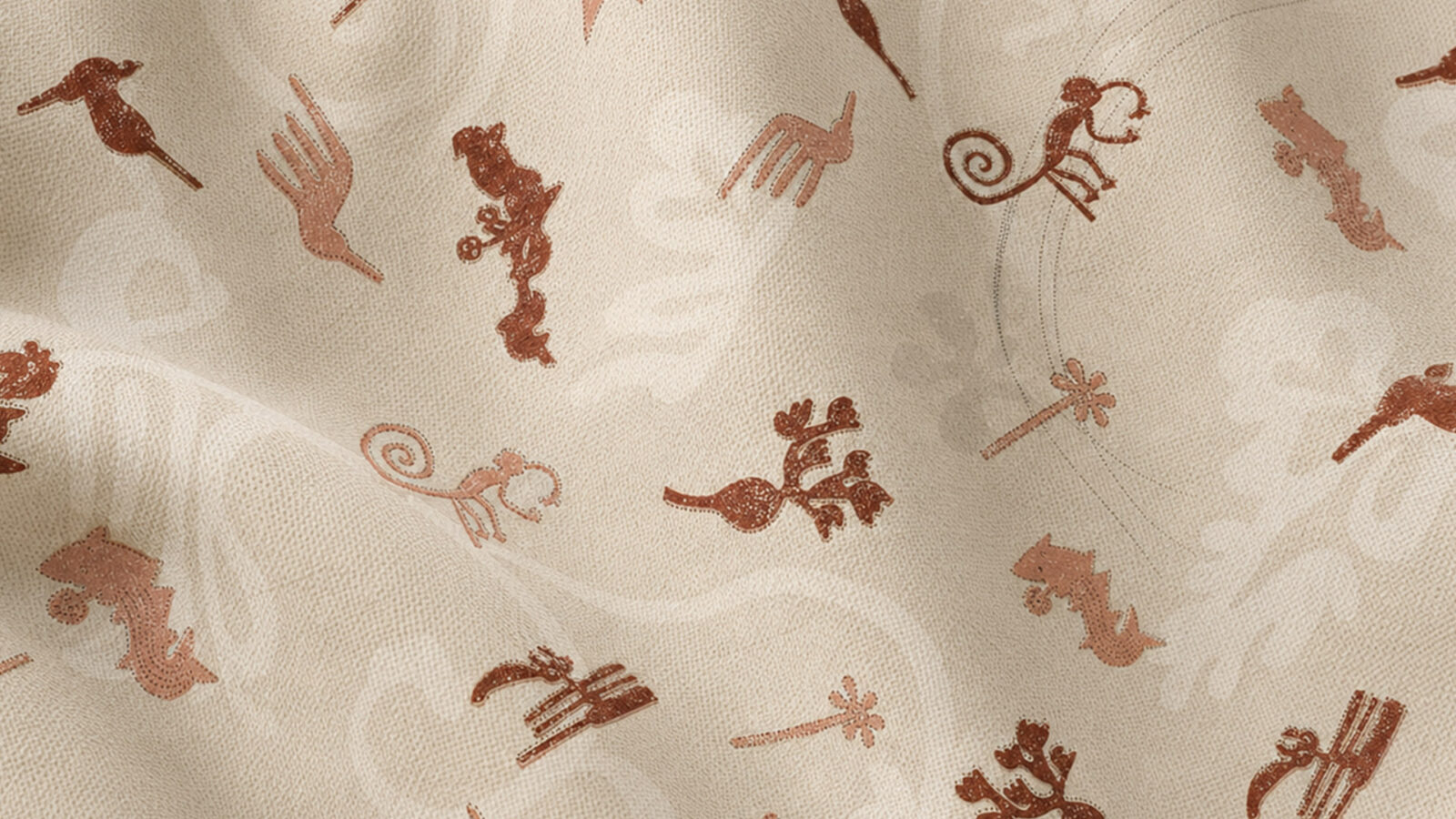 Beige textured fabric with scattered reddish-brown ornamental silhouettes and scroll motifs.